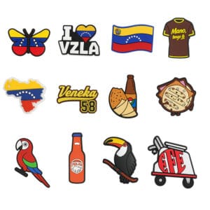 Venezuelan shoe charms, including a flag, arepa, toucan, butterfly, and other national symbols.