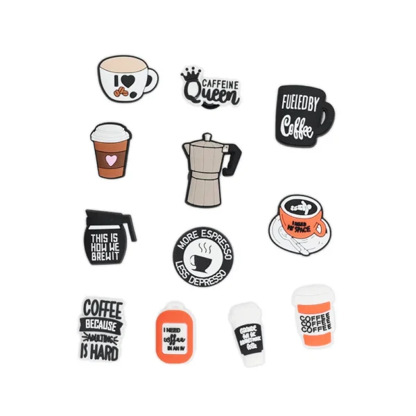 White footwear decorated with Coffee Shoe Charms, including espresso cups, caffeine-related phrases, and coffee mugs.