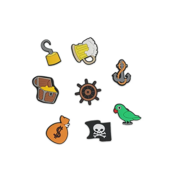 White footwear decorated with pirate-themed charms, including a treasure chest, pirate flag, anchor, ship wheel, and parrot