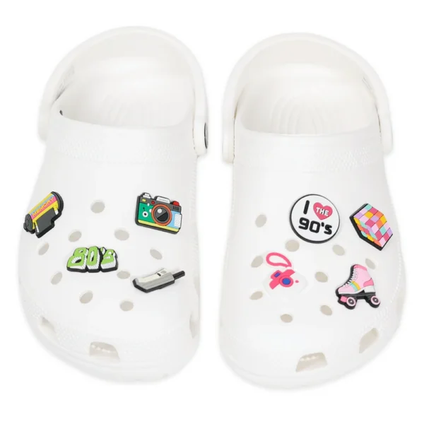 80s and 90s charms on white Crocs – cassette, camera, skates and more