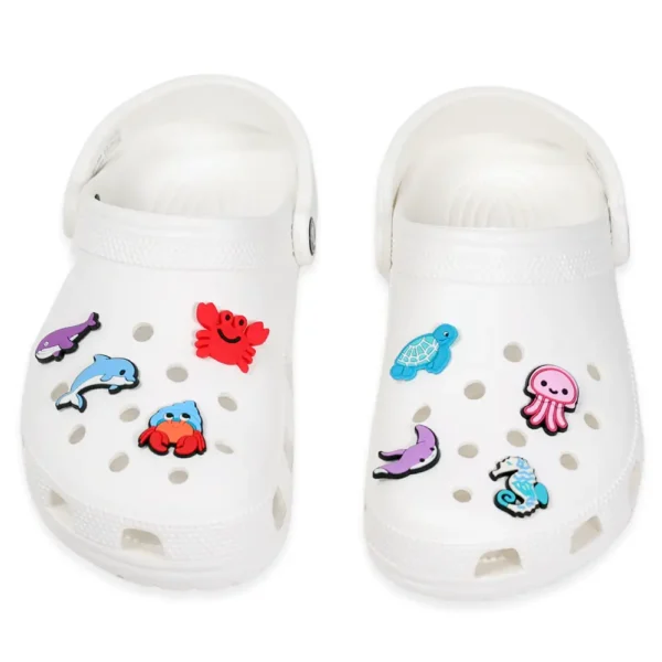 Aquatic shoe charms on white Crocs – tropical sea creature decorations for summer vibes