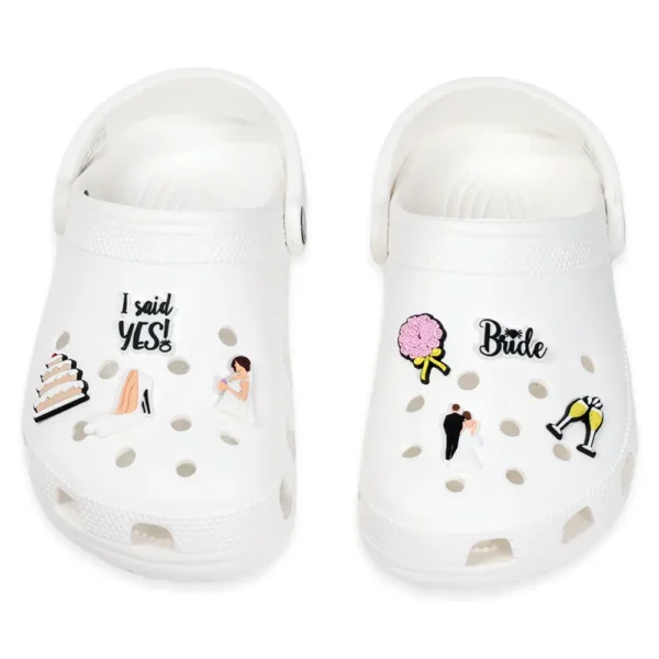 Bride Shoe Charms placed on white Crocs