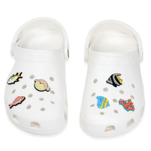Fish shoe charms on white Crocs – ocean theme with vibrant summer colors