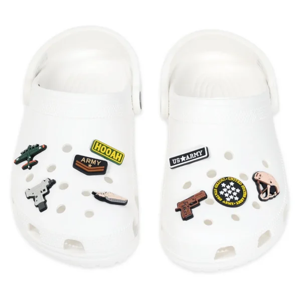 White footwear decorated with Military Shoe Charms bundle compatible with Crocs – includes army, air force, gun, and combat-themed charms