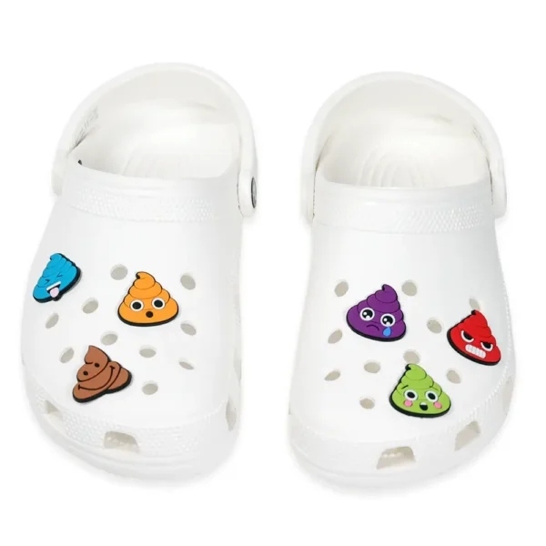 Poop Shoe Charm - White Crocs decorated with colorful poop emoji charms featuring different faces and moods.