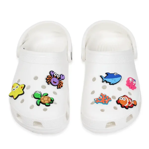 Sea creature shoe charms on white Crocs – perfect for kids and summer fun
