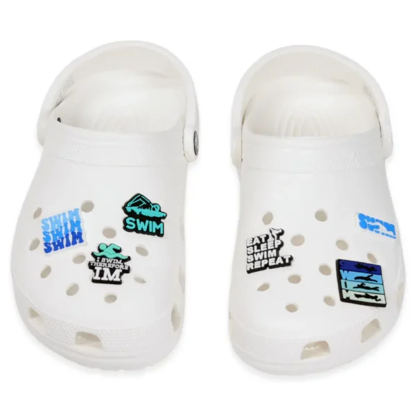 Swimming charms styled on white Crocs – ideal for swimmers and athletes